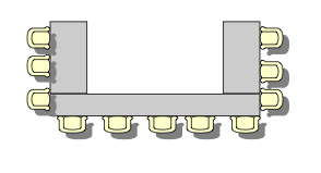 3 tables in 'u' formation with 2 shorter tables and one longer table. 11 chairs are under the table on the outside of the 'u'